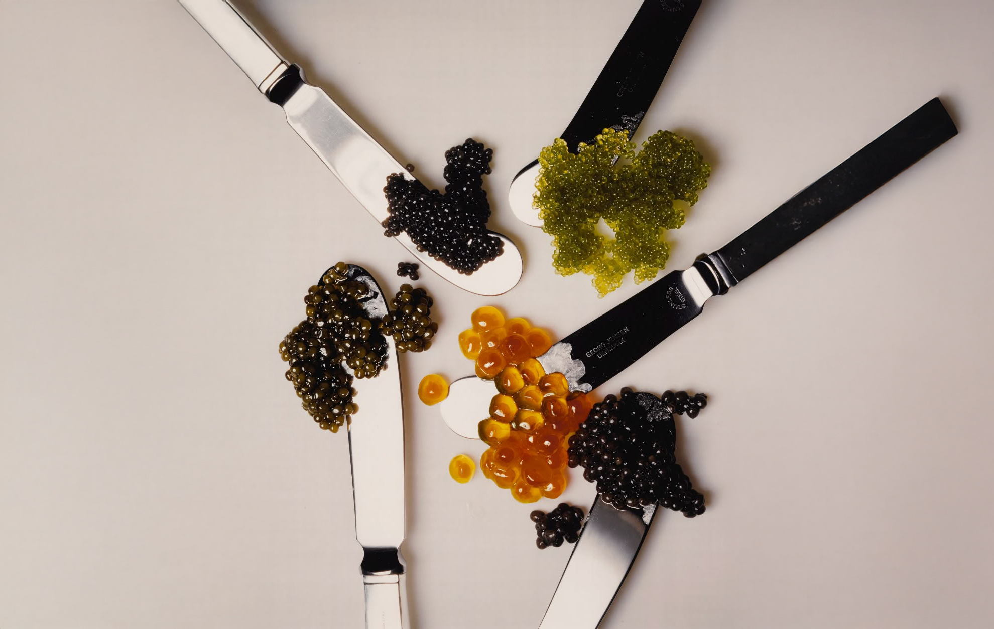 A luxurious table setting featuring Monsieur Nia caviar, shared between two people.